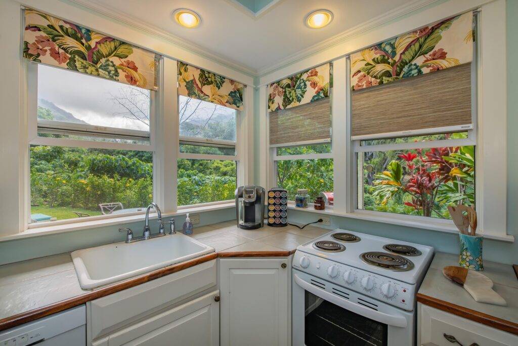 Cottage kitchen tiled counter sink and stove