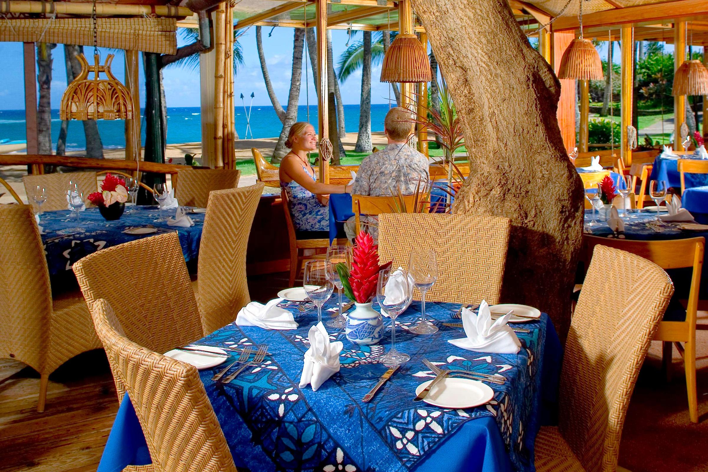 Diners at Mama's Fish House at Kuau Cove outside of Paia Maui, Hawaii