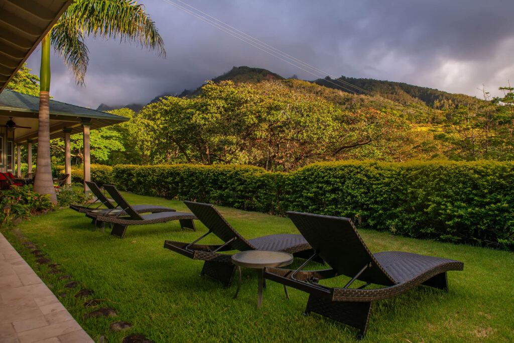 Palms room rental outside lounge chairs